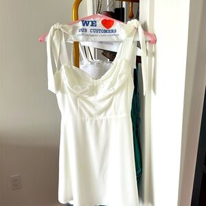 Lucy in the sky white dress. Perfect for spring break or graduation.